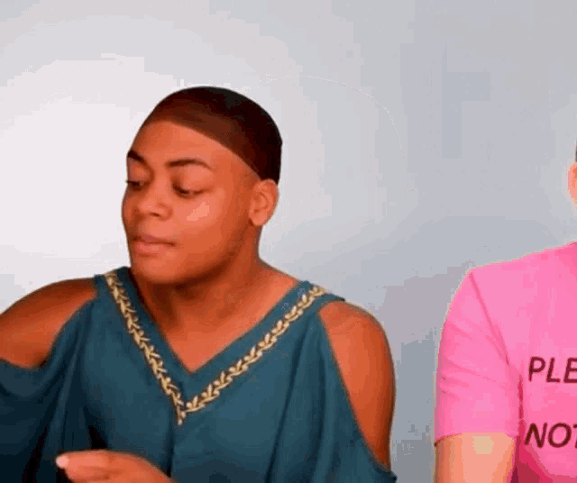 a woman in a pink shirt that says " please not "