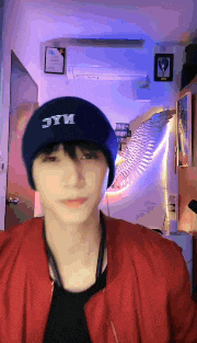 a person wearing a blue hat with jym on it