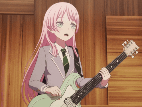 a girl with pink hair is holding a guitar that says gibson on it