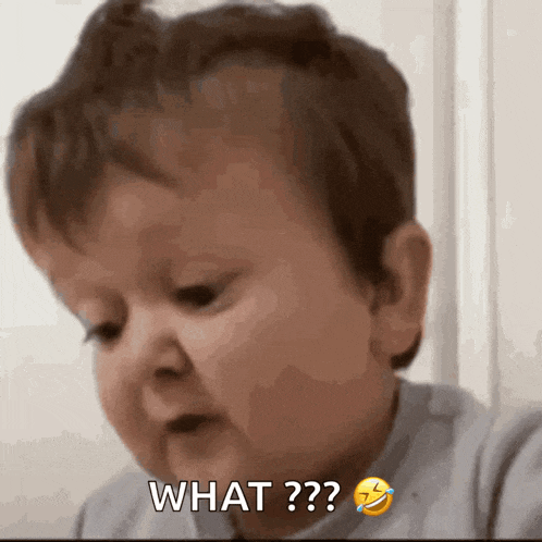 a baby is making a funny face and says what ??