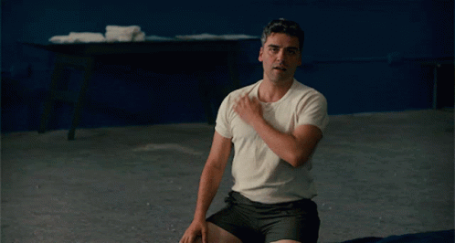 Oscar Isaac Movie GIF - Oscar Isaac Movie Stretching GIFs