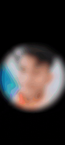 a blurry picture of a person 's face is displayed on a black background