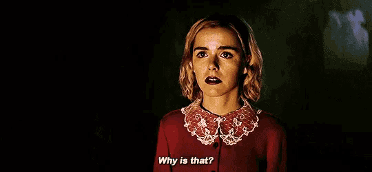 a woman in a red jacket and white lace collar is asking why is that ?