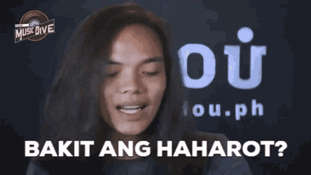 a man with long hair says bakit ang haharot in front of a music dive logo