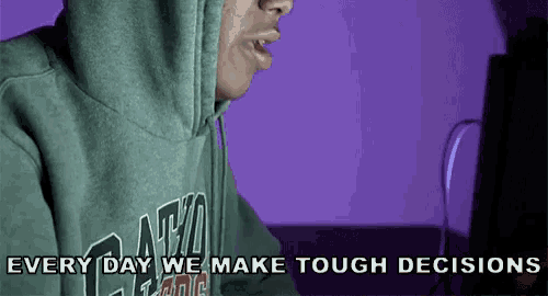 a man wearing a hoodie that says ' every day we make tough decisions '
