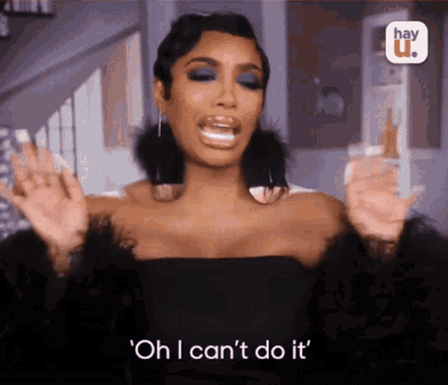 a woman says " oh i can 't do it " in front of a hay u. logo