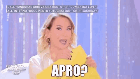 a woman holding a piece of paper with the word apro written on it