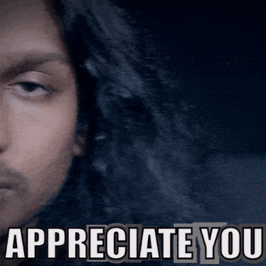 a close up of a man 's face with the words " appreciate you " below it