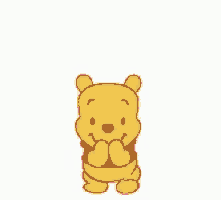 winnie the pooh is wearing a red shirt and holding a pink heart over his head .