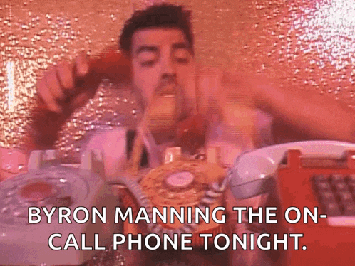 a man is talking on a rotary phone with the words byron manning the on call phone tonight