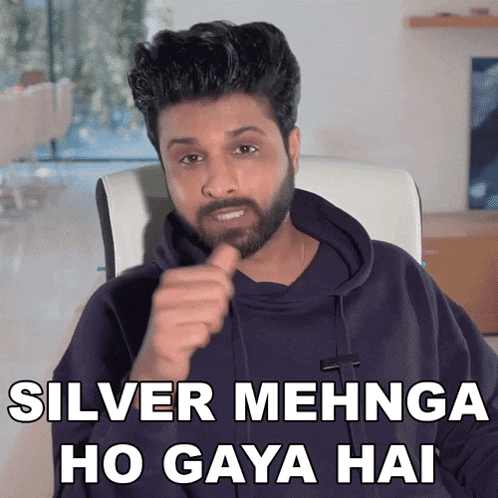 a man with a beard is giving a thumbs up and says silver mehna ho gaya hai