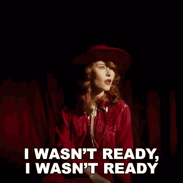 a woman in a red hat is saying i wasn 't ready , i was n't ready .