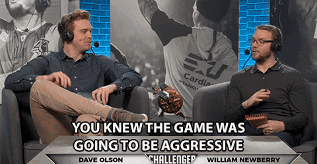 two men are sitting on a couch with the words " you knew the game was going to be aggressive challenge "