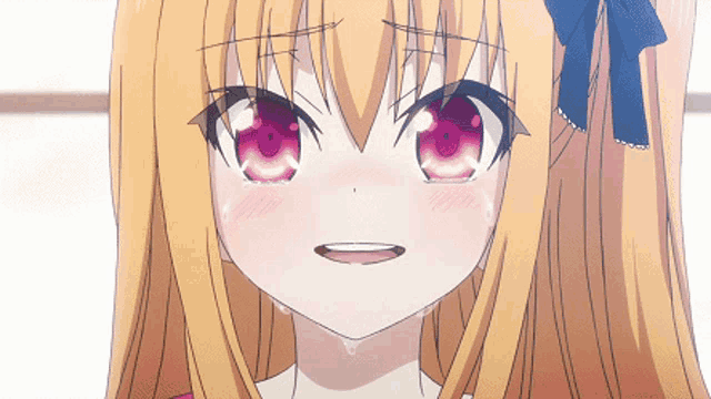 a close up of a girl 's face with tears running down her face