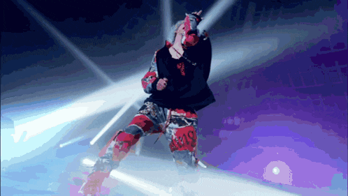 a pixelated image of a person singing with a microphone