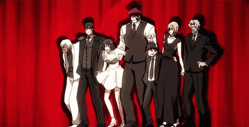 a group of people are standing next to each other on a stage .