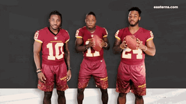 three washington redskins players pose for a picture