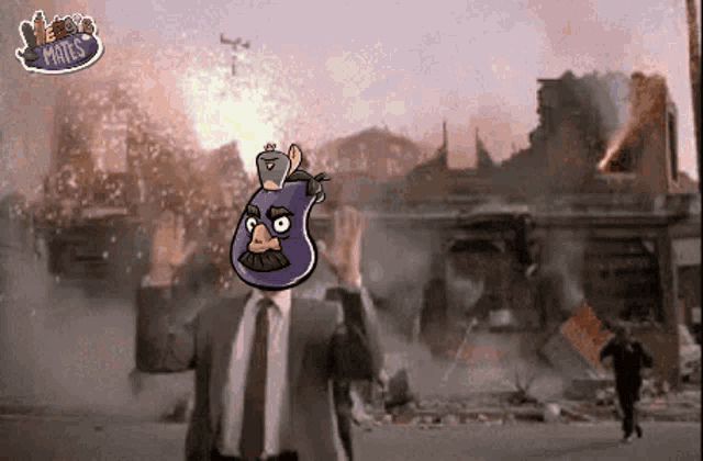 a man in a suit and tie with a cartoon character on his head and a sticker that says ' angry birds '