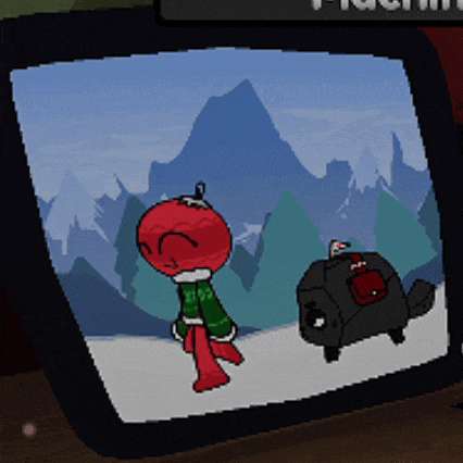 a picture of a red apple and a black turtle on a screen with a mountain in the background