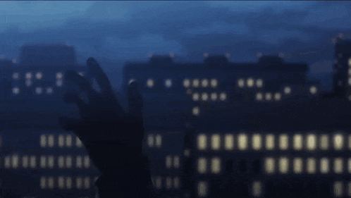 a blurry picture of a city at night