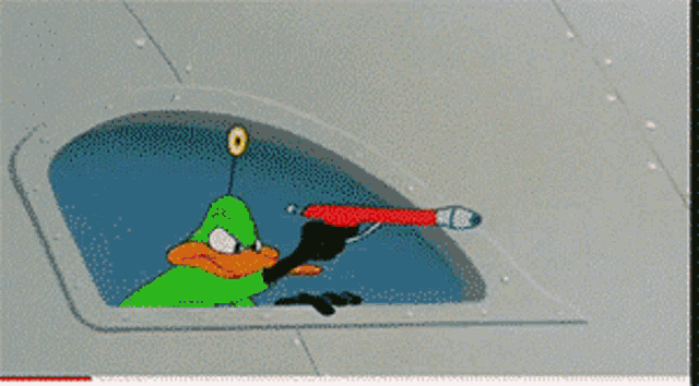 a cartoon character named marvin the martian is standing in front of a window
