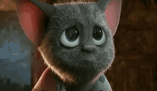 a close up of a cartoon cat with a sad look on his face