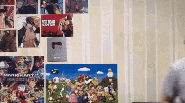 a mario kart poster is hanging on a wall
