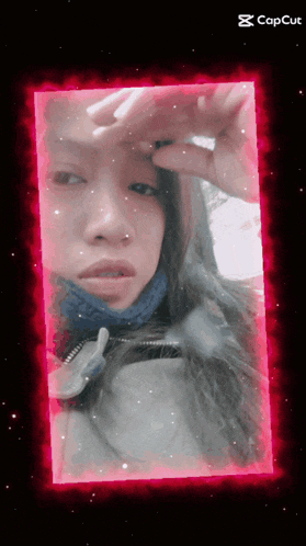 a picture of a woman in a pink frame with capcut written below it