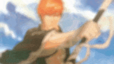 a blurry picture of a man with orange hair holding a rope .