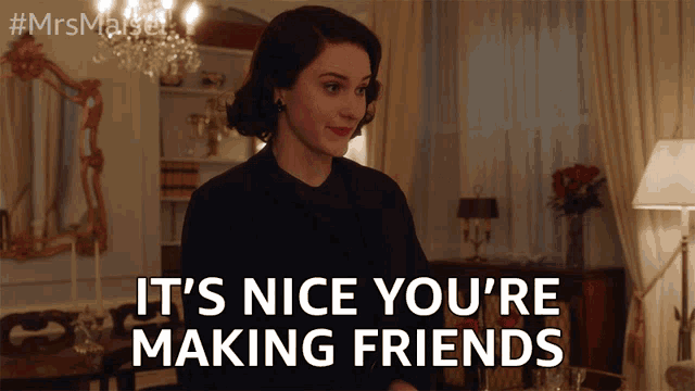 a woman in a living room with the words it 's nice you 're making friends