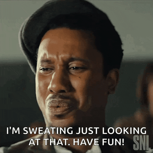 a man in a hat says i 'm sweating just looking at that have fun !