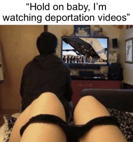 a man and woman are watching deportation videos