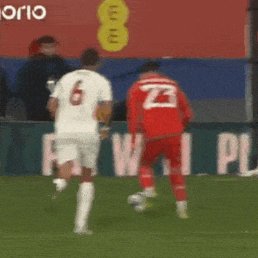 a soccer player with the number 2 on the back of his shirt
