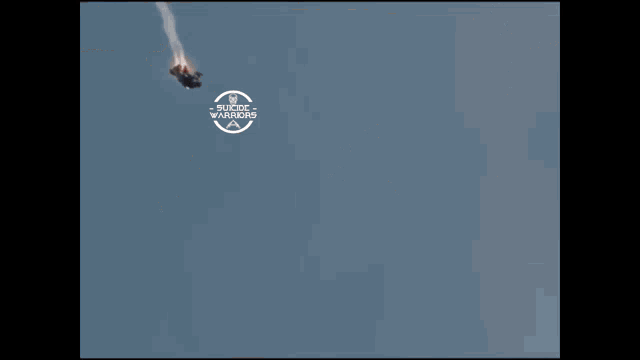 a suicide warriors logo can be seen on a screen