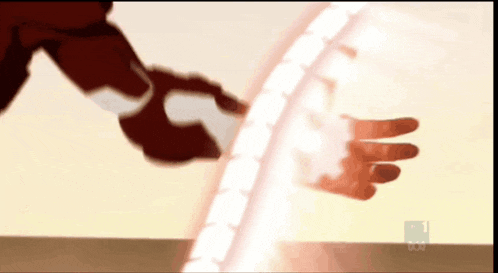 a close up of a person 's hand holding a shield with a tbc logo in the corner