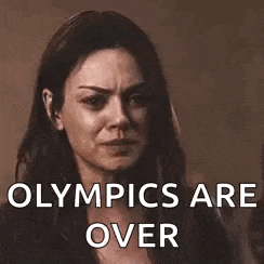a woman is crying while covering her mouth with her hand and the words `` olympics are over '' .