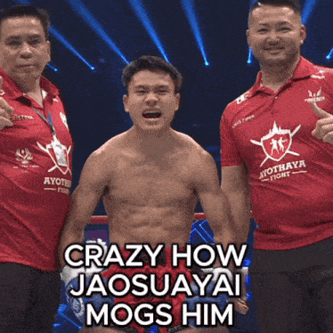 a man in a red shirt that says ayothaya fight stands next to two other men