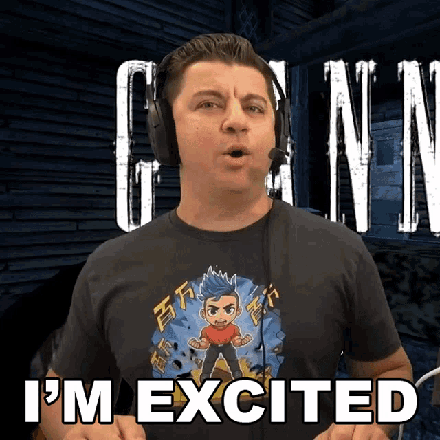 a man wearing headphones and a shirt that says " i 'm excited "