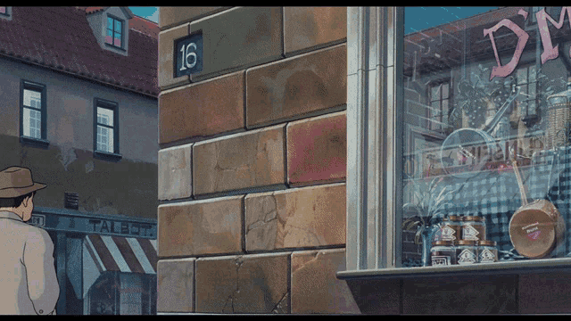 a brick building with the number 16 on the side