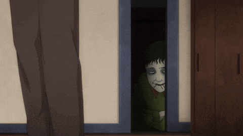 a cartoon character is peeking out of a door