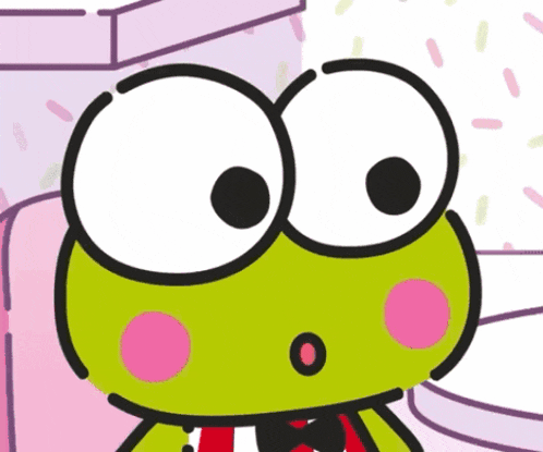 a green frog with big eyes and a red and white scarf around its neck