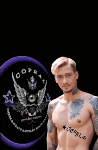 a shirtless man with a tattoo on his chest that says cl