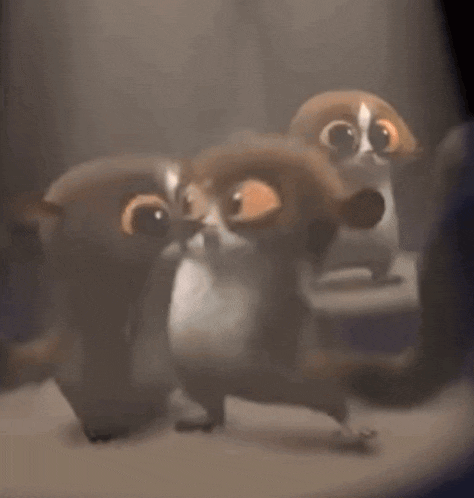 a group of cartoon animals with big eyes are standing together