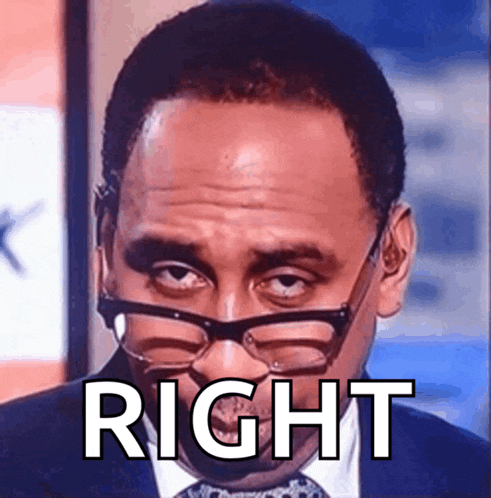 a man wearing glasses and a suit has the word right above him