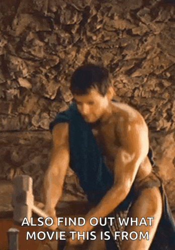 a shirtless man is holding a hammer in front of a stone wall and says also find out what movie this is from .