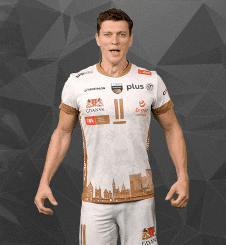 a man wearing a white shirt that says gdansk on the front