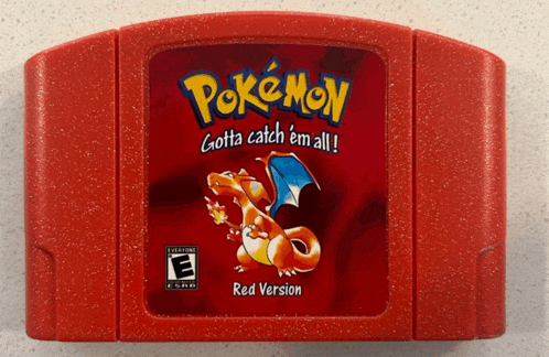 a red pokemon game cartridge that is rated e