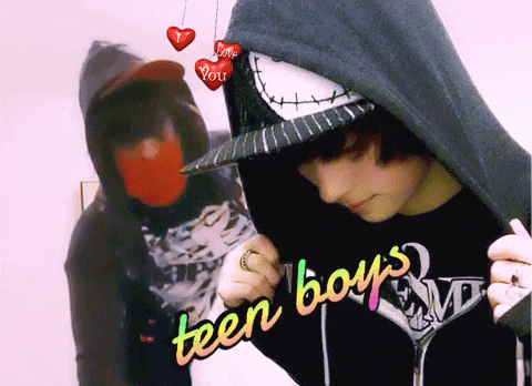 a teen boy wearing a hoodie with the words teen boys on it