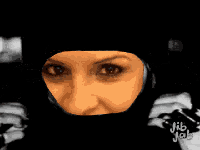 a black and white photo of a woman with jib jab written on the bottom right corner