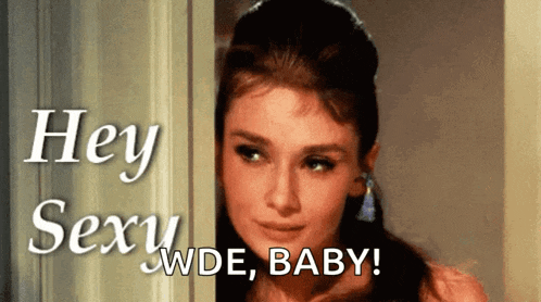 a woman standing in a doorway with the words hey sexy wde baby